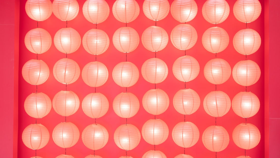 At-home red light therapy device glowing warmly